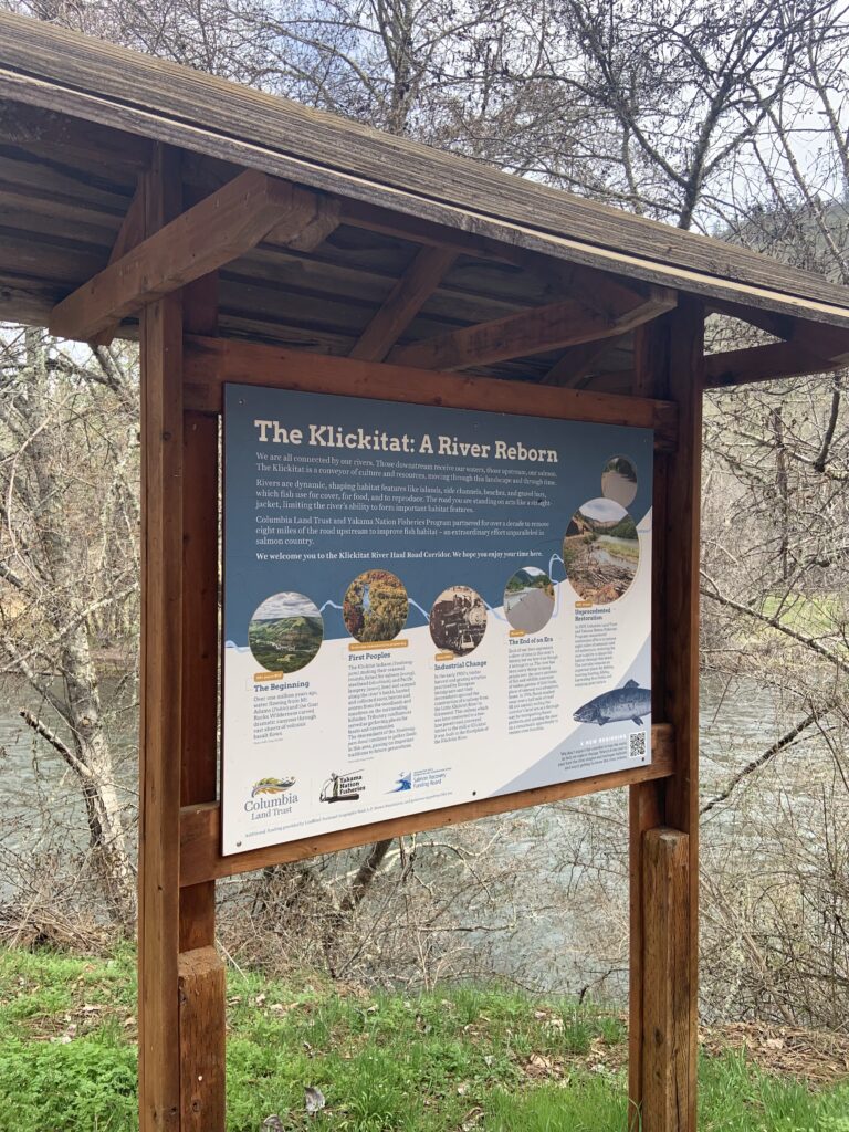 an interpretive sign with information about the klickitat river and land trust restoration projects