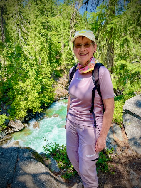 janet hiking by a river